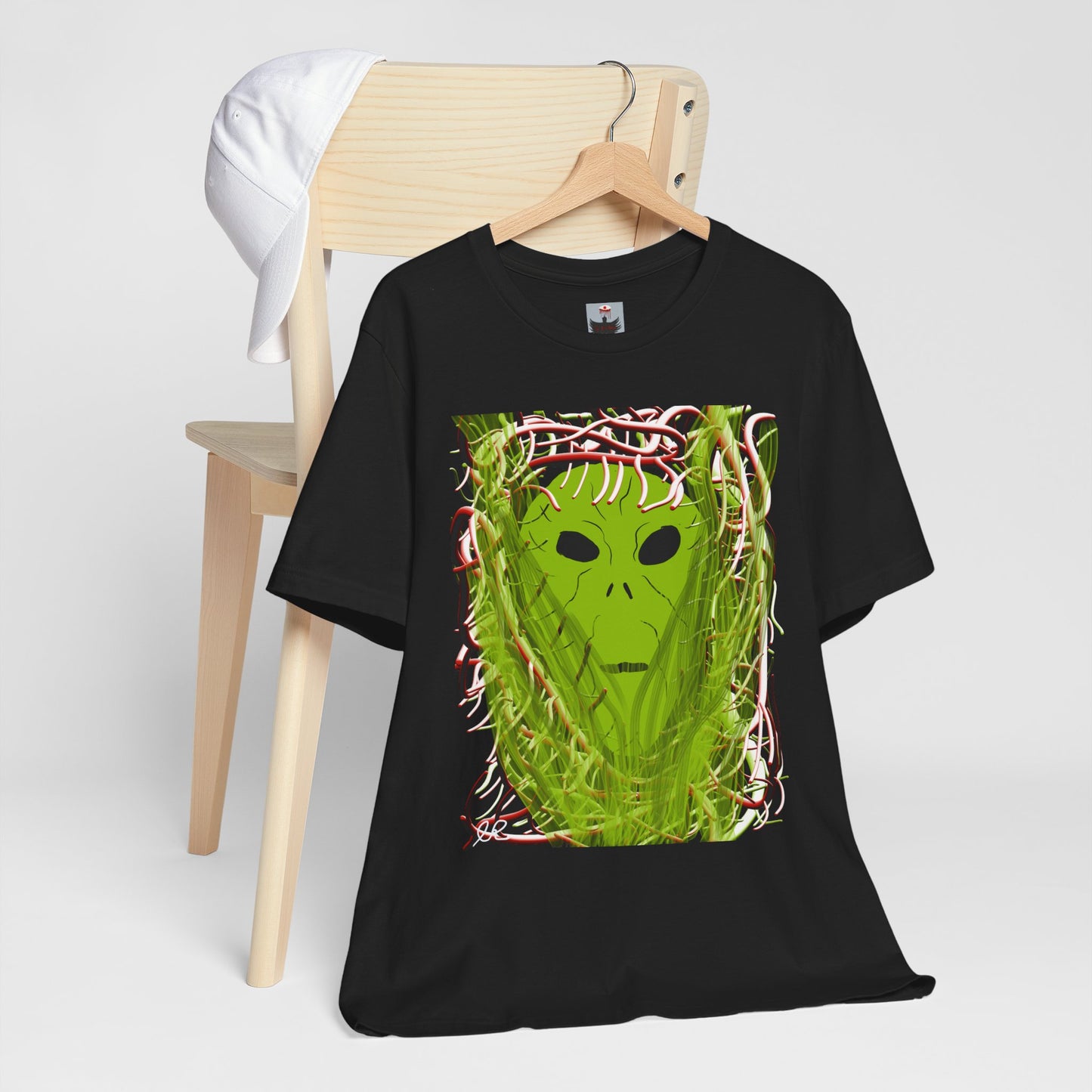 Alien Emerges T-Shirt — Green Extraterrestrial Face in Vines Graphic Tee